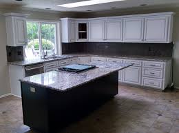 The extra little bit of coverage helps protect the cabinets or appliances below from any spills or crumbs from the top of the island. Kitchen Island Cabinets The Center Of Attention Outside The Box