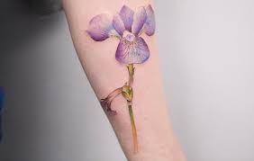 22 Grandiose Iris Tattoo Designs And Meanings Tattoobloq Iris Tattoo Iris Flower Tattoo Tattoo Designs And Meanings