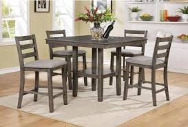 Gabriel counter height dining table with storage pedestal base cappuccino. This Five Piece Counter Height Table Set Is A Great Way To Update A Casu Counter Height Dining Table Set Counter Height Dining Sets Counter Height Dining Table