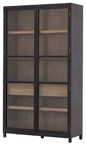 Display your collectibles in a glass door cabinet. Millie Drifted Black Oak Wood Glass Door Display Cabinet Transitional China Cabinets And Hutches By Zin Home