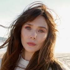 Photos of Elizabeth Olsen with Julia McDermott and playwright Brian Watkins  at the press night after party for 'WEATHER GIRL' in London.