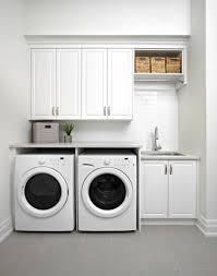 The vanity is custom built of walnut and the counter is white quartz. 75 Beautiful Gray Laundry Room Pictures Ideas July 2021 Houzz