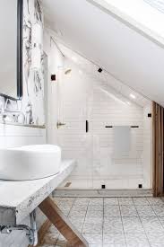 You could try anything from shelves to beadboard walls with tiled floors like the one in the picture. Before After The Tiny Suite Remodel Sloped Ceiling Bathroom Shower Loft Conversion B Sloped Ceiling Bathroom Small Attic Bathroom Small Bathroom Remodel