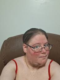 Shaving and plucking facial hair twice daily