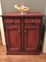 Cabinet Refinished With Annie Sloan Chalk Paint Napoleonic Blue As The First Coat Then Follow Red Furniture Annie Sloan Furniture Chalk Paint Kitchen Cabinets