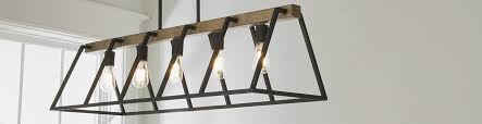 Crafted of metal in a premium finish, this fixture's frame strikes a dramatic silhouette featuring dramatically scrolled arms, faceted crystal columns. Chandeliers Distinguish Your Style Shades Of Light
