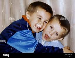 Police norfolk police missing boy family with sibling arms round hi-res  stock photography and images