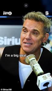 Robbie Williams admits he believes Taylor Swift didn't know who he was when  he joined her