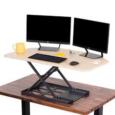 Create a little nook in an unexpected place by tucking in a corner desk or table. Counter Height Office Desk Target