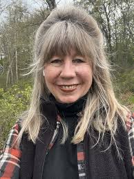 Is this Ernie's grandmother, Mrs Donald McLean, in the old photos?