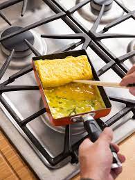 Iron Chef Morimoto S Step By Step Guide To Making The Perfect Japanese Omelet Iron Chef Recipes Iron Chef Easy Japanese Recipes