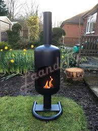 Quite the opposite, patio heaters are dangerous to use indoors. Large 19kg Gas Bottle Log Wood Burner Chimenea With A Stand Outdoor Patio Heater In Garden Amp Patio Barbecu Patio Heater Gas Bottle Wood Burner Wood Burner