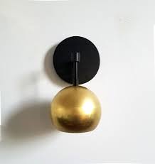 Candle wall sconces black walls modern wall sconces black wall sconce swing arm wall lamps sconces. Loa Sconce With Brass Shades Sazerac Stitches