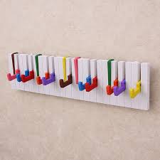 A wide variety of wall mounted coat hanger options are available to you, such as plastic type, feature. Decorative Rainbow Piano Design Wall Mounted Coat Hanger Shelf Welcome To Esshelf