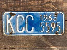 Kansas Commerce Committee License Plate Number 5595 From 1963 In Blue With White Letters Licenseplate Kansaslicense 5595 License Plate Car Plates Plates