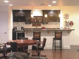 Make sure to maximize the space by adding wall hanging. Tips Small Basement Kitchen Ideas In Color Top Basement Throughout Bar Ideas For Living Room Awesome Decors
