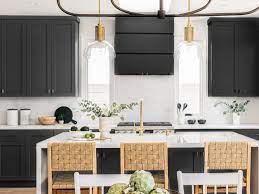 Black cabinets paired with steel accents are the perfect combination when you want to add some sort of classic element to the kitchen while still being classic and put together. Kitchens With Black Cabinets