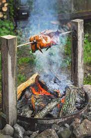 Cooking a whole chicken over a fire pit presents several obstacles to finishing with an evenly cooked chicken. Campfire Smoked Rotisserie Chicken Mighty Mrs Super Easy Recipes