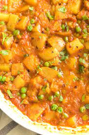 Aloo Matar Indian Peas Potatoes In Tomato Gravy Vegan Recipe In 2021 Indian Food Recipes Indian Potato Recipes Easy Indian Recipes