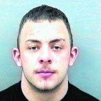 Man, 22, jailed over glassing in town bar