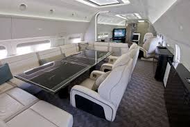Excellent Private Jet Interior Design With White Leather Comfort Sofa And Contemporary Black Table Private Jet Interior Aircraft Interiors Boeing Business Jet