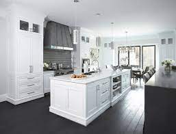 White kitchen cabinets with grey hardwood floors. White And Grey Kitchen Contemporary Kitchen Sherwin Williams Pure White Linda Mcdougald Design