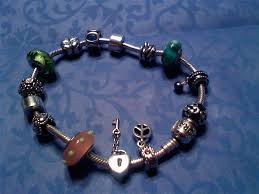 Unlock the bracelet on one side (you choose) by pressing the special button lock. How To Open A Pandora Bracelet Pandora Bracelet Pandora Jewelry Pandora Bracelet Charms