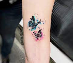 Photo Butterflies Tattoo By Cana Arik Tattoos Photo 23046 Butterfly Tattoo Meaning Butterfly Tattoo Designs Butterfly Tattoos For Women