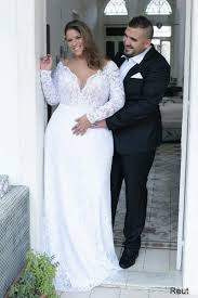 Within the past 10 years or so dresses slowly became a popular bridal trend. Lace Mermaid Corset Plus Size Wedding Gown With Sleeves Takes A Visual Size 3 Si Plus Wedding Dresses Long Sleeve Wedding Dress Lace Wedding Dress Long Sleeve