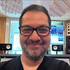 Can Cherry Red acquire Olivia Newton-John's music catalog from Primary Wave?