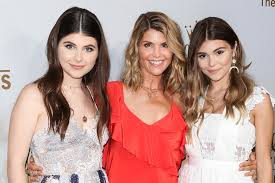File photo of meghan markle and prince harry. Lori Loughlin S Daughters It Ll Be Surreal To Visit Her In Jail