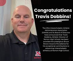 The Ohio Interscholastic Athletic Administrators Association (OIAAA) and  its Board of Directors have announced that Travis Dobbins, Athletic  Director of Norton High School, has been awarded the prestigious Bruce  Brown Award of