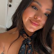 Who can take casual headshots for a therapist's private practice website?