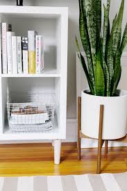 3 Ways To Style And Use Ikea S Kallax Expedit Shelf The Everygirl Home Interior Accessories Kallax Ikea Shelves