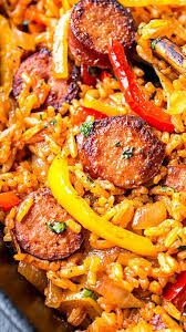 Smoked Sausage And Red Rice Skillet The Cozy Apron Recipe Sausage Dishes Smoked Sausage Recipes Stuffed Peppers