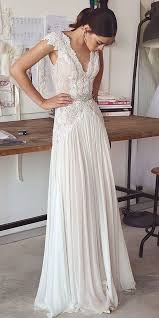 10 Wedding Dress Designers You Will Love Top Wedding Dress Designers Boho Wedding Dress Backless Wedding Dresses