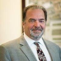 News from John Aitken ('99)