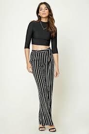 Black And Yellow Striped Palazzo Pants A Pair Of Woven Palazzo Pants Featuring Vertical Stripes A Self Tie Belt Concealed Side Zipper And A St Striped Wide Leg Pants Striped Palazzo Pants Fashion