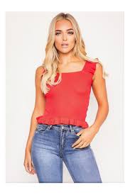 Robe pull en maille majoritairement viscose (reconstitution de fibre de bois). Robe Pull Droite Rouge Sans Manches Brentiny Paris