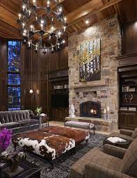 50 Living Room Lighting Ideas Take Your Living Room From Gloom To Glow Homeluf Fireplace Design Stone Fireplace Designs Modern Interior Design