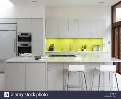 lime coloured backsplash in modern