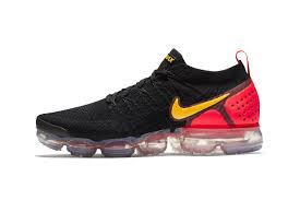 Black And Yellow Nike Tennis Shoes Nike Air Vapormax Flyknit 2 0 Gets Flashy In Black Red Yellow Nike Air Vapormax Yellow Sneakers Nike Air