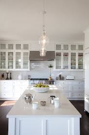 Double stacked cabinets are an option that involves adding a third row of cabinets above the hanging wall cabinets. Double Stacked Upper Cabinets Design Ideas