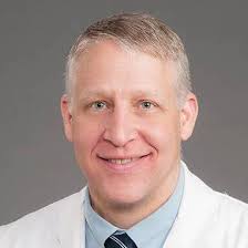 Travis L. Dotson, MD