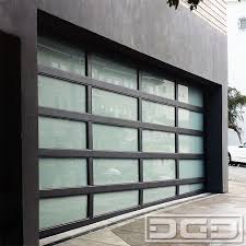 About overhead door company of se mo overhead door company of southeast missouri has been in business since 1957. Metal Glass Garage Doors With Sloping Bottom Section Custom Made For A San Francisco Ca Mo Contemporary Garage Doors Garage Door Design Custom Garage Doors