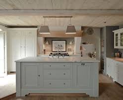Add a touch of traditionalism by pairing gloss units with wooden worktops. 12 Farrow And Ball Colors For The Perfect English Kitchen Grey Kitchen Island Kitchen Cabinet Colors Farrow And Ball Kitchen