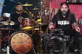Came on the scene in 1967 with vanilla fudge pioneered big drum concepts and power rock drumming played with cactus , jeff beck, rod stewart behind the kit. Watch Mike Portnoy Pay Tribute To Neil Peart On A Toy Drum Kit