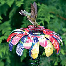 And really, you don't have to have red hummingbird feeders. Sugar Shack Flower Stakes Recycled Upcycled Hummingbird Feeder From Jacks