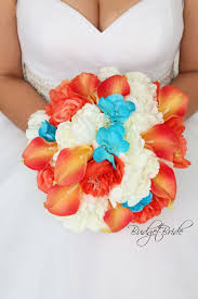 Seashell bouquets are not hard to make, if you are a skilful crafty person with a glue gun. Beach Theme Wedding Bouquet With Coral Calla Lilies And Teal Hydrangea A Perfect Match For A Turquoise Wedding Flowers Coral Calla Lilies Silk Flowers Wedding