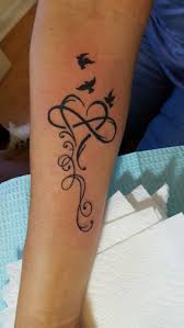 The Love For My Son And His Chirdren He Has Grown Into A Wonderful Man Starting Tattoos Tattoos Tattoosform Mother Tattoos Feather Tattoos Tattoos For Kids